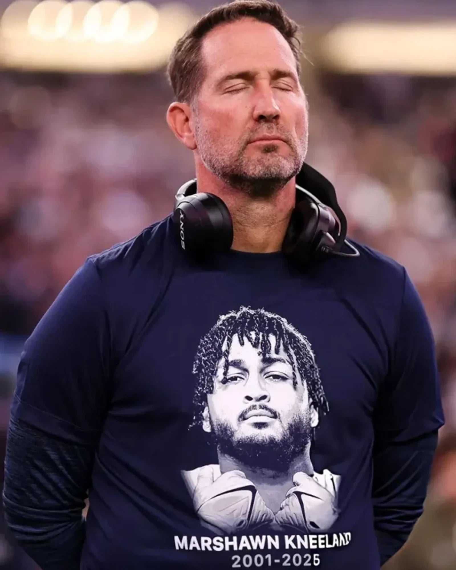 Brian-Schottenheimer-Marshawn-Kneeland-Shirt